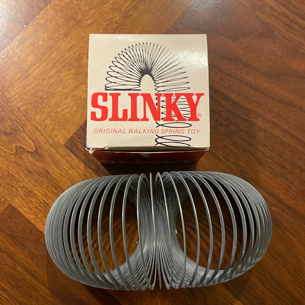 VINTAGE JAMES INDUSTRIES, INC SILVER SLINKY TOY WITH ORIGINAL BOX - CLASSIC!